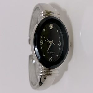Oval, Beveled, Black/Silver-plated Quartz Bracelet Watch, w/Silver Star “12” NWT